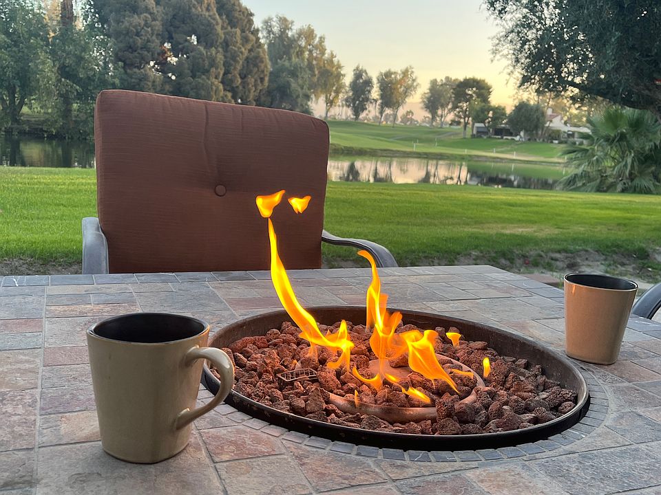 Fire pit with four chairs.