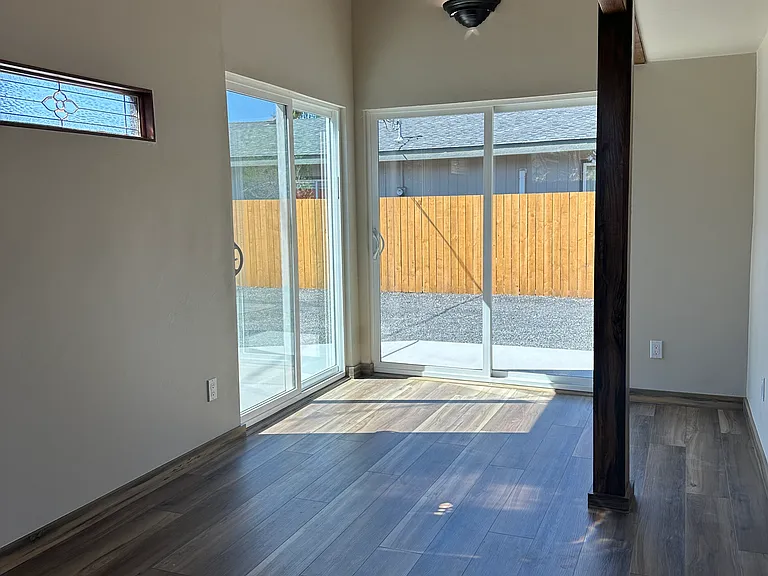 Living area with dual sliding glass doors
