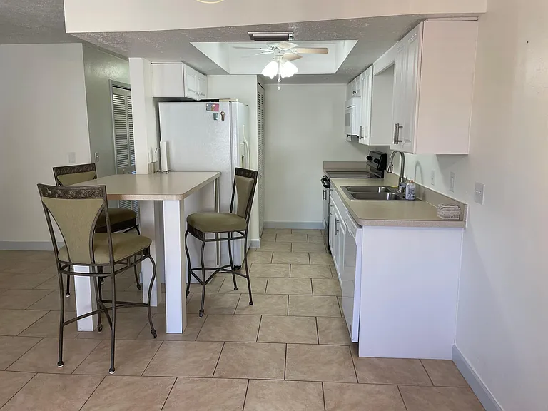Kitchen with breakfast bar...