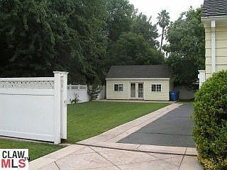 Driveway with Storage Shed