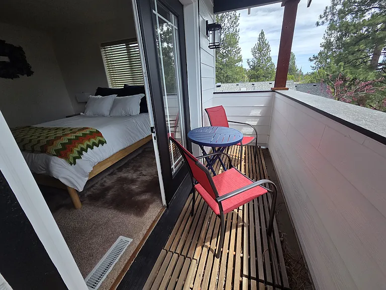Master bedroom private balcony seating.