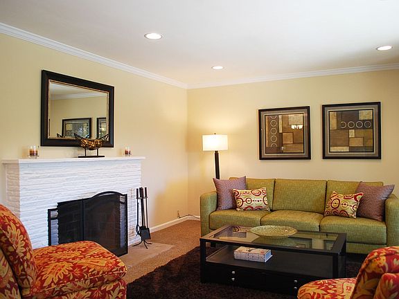Guests will enjoy the inviting ambiance created by the recessed lighting &amp; woodburning fireplace