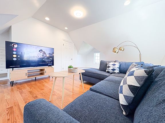 Living Room: Comfy sectional sofa accommodates a large party of guests