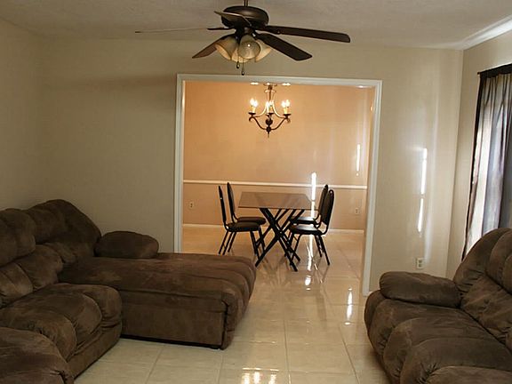 Formal Living, Large Tile flooring in the entire House