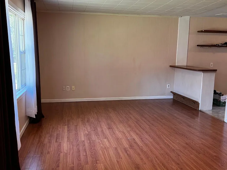 Large living room, family room. With great picture window.