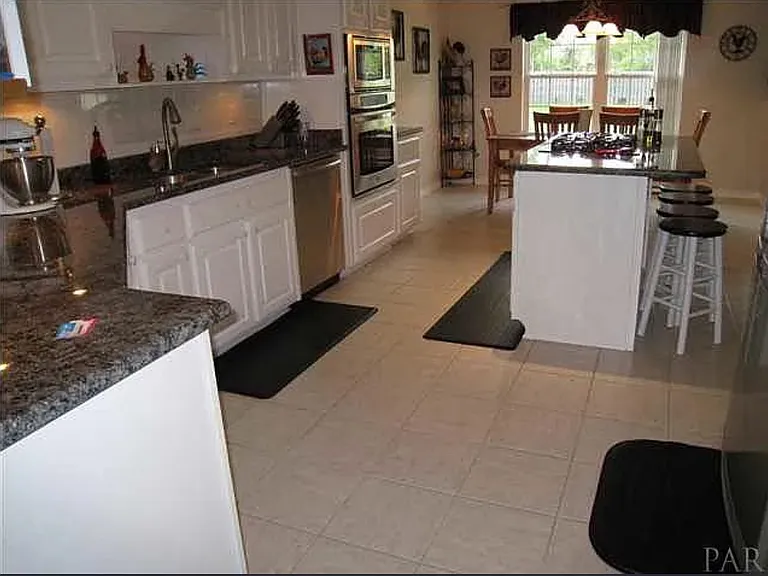7570 Woodmont St — Photo 2