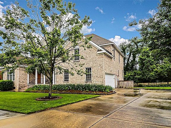 Large driveway and side-loading garage