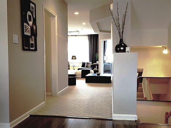 Stairwell leading to main level and hallway to living area