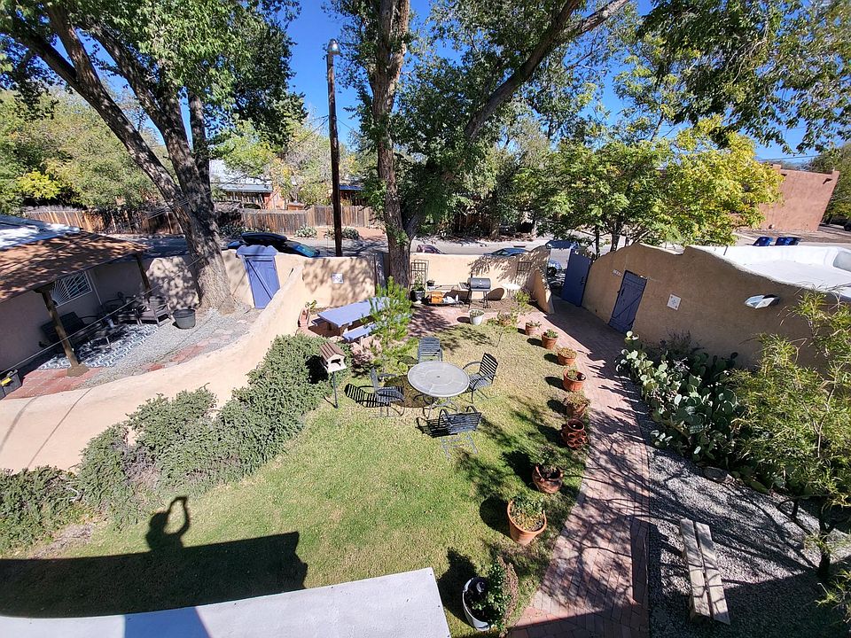 View of the shared courtyard area from the roof of the unit. This unit also has a private, gated yard and enclosed porch area