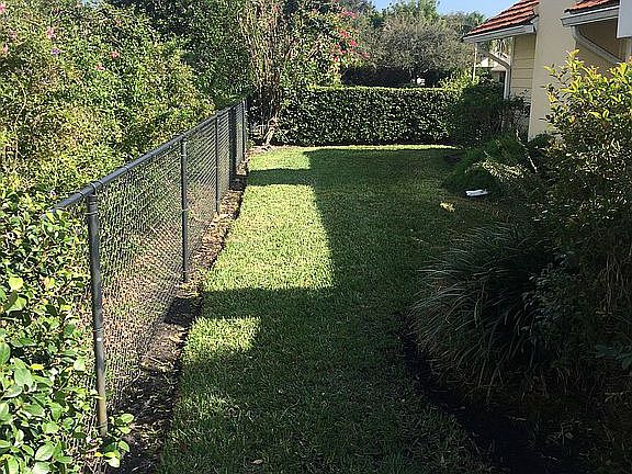 Fully fenced in side yard