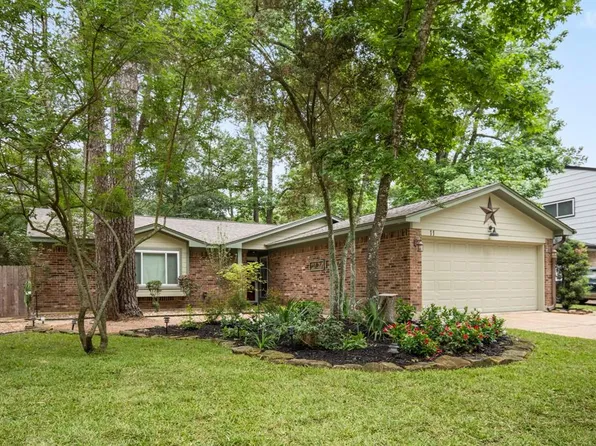 11 W Woodtimber Court, The Woodlands, TX 77381