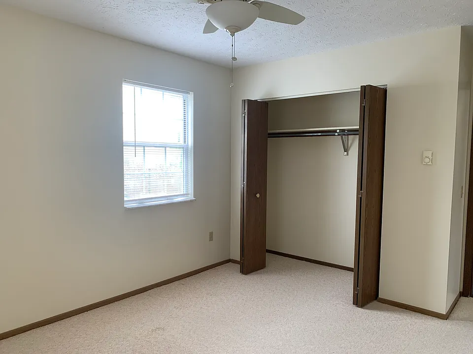Large bedroom closet. Nice ceiling fan.