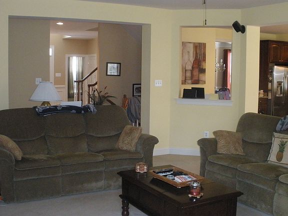 family room open to hallway and kitchen