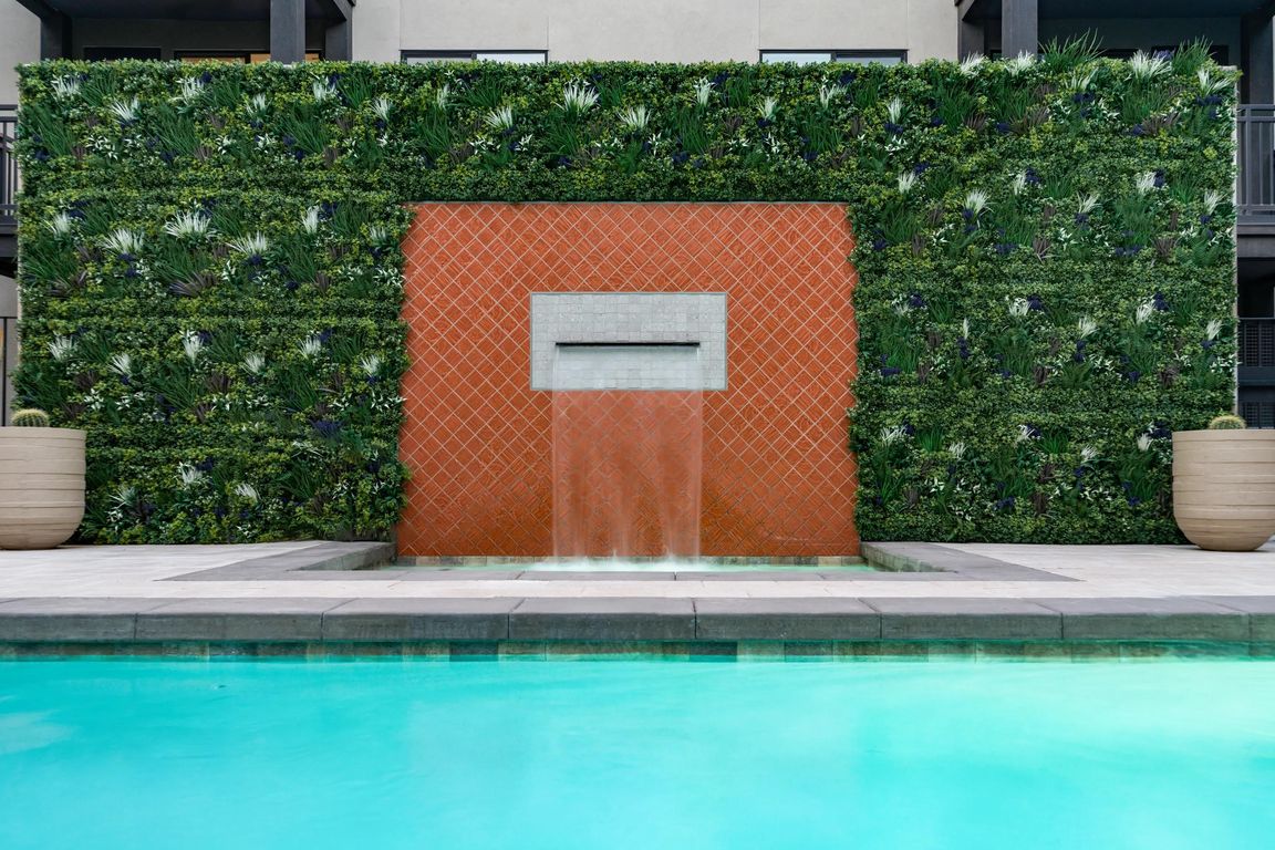 A refined pool retreat at Modera Higley Commons, offering a polished escape just minutes from Gilbert's dining, shopping, and everyday conveniences.