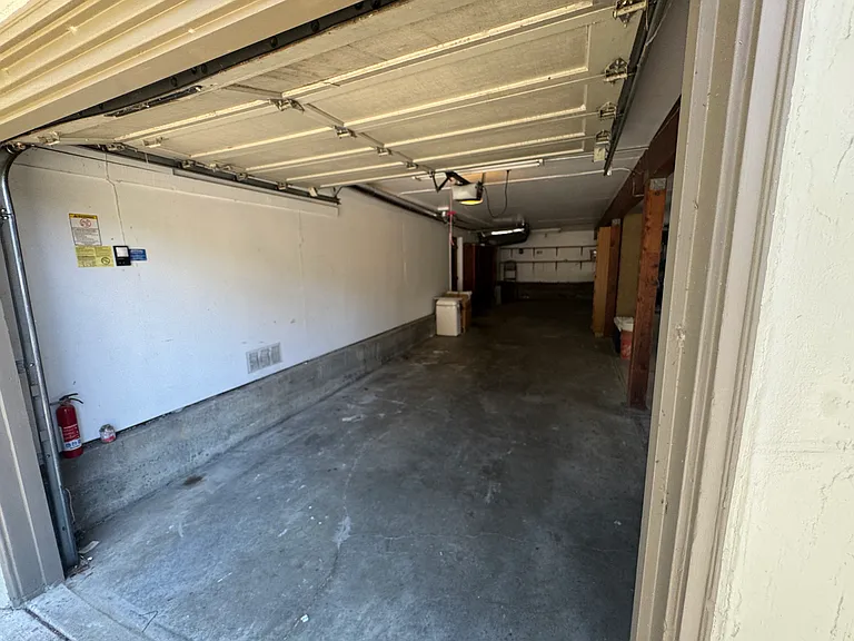 Spacious garage (unit 58 has left half of 4-car garage).