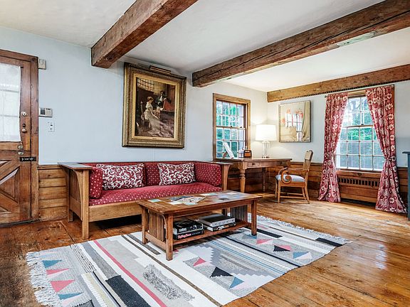 Living room facing breezeway entrance door