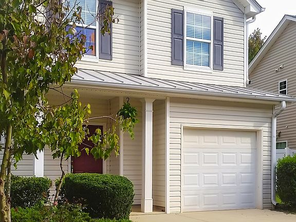 1 car garage and 4 parking spaces in driveway