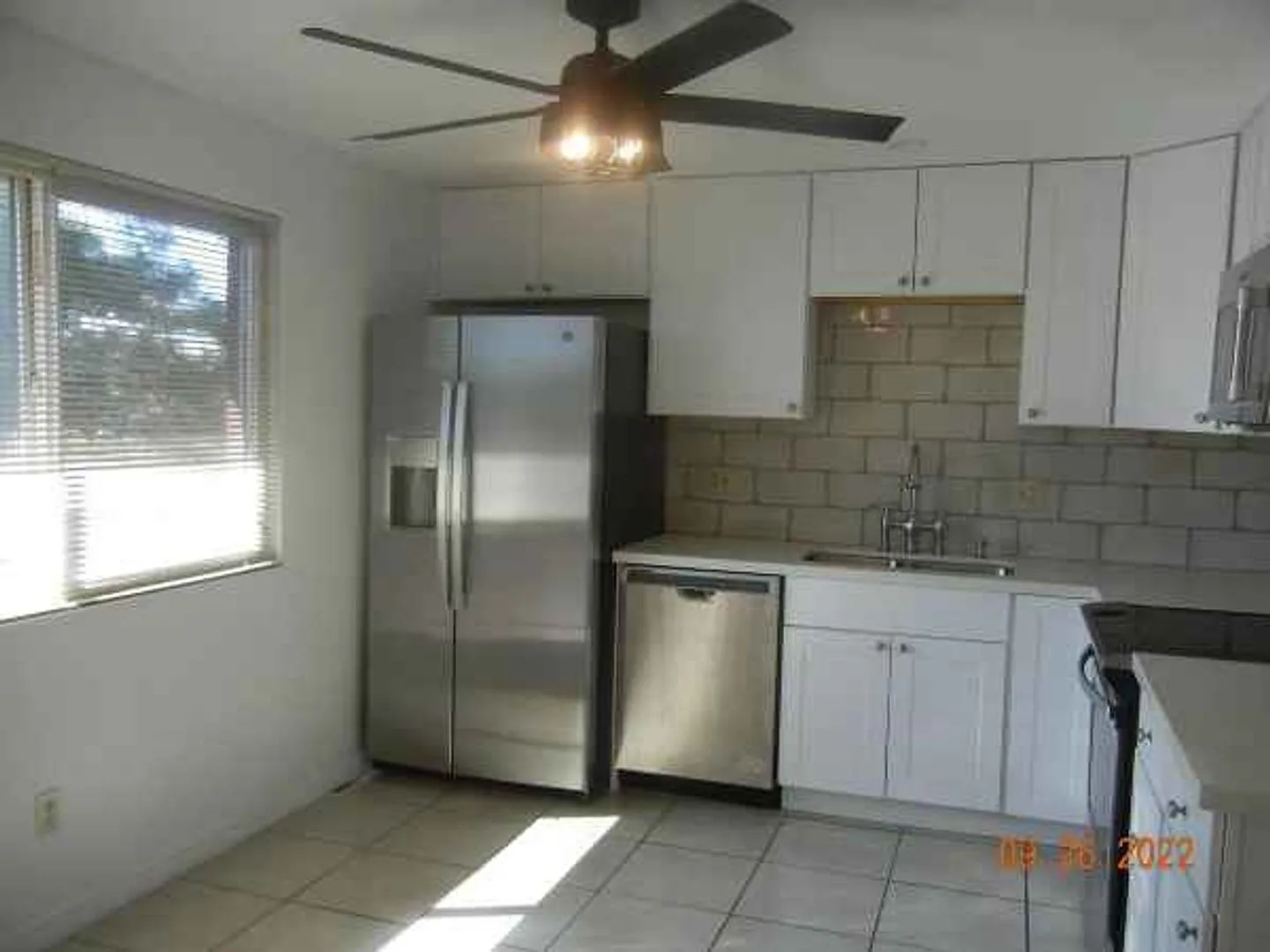 2-Bed/1.5-Bath Townhome with Carport and Extra Storage — Photo 4