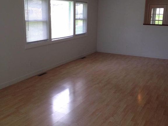 Large windows for scenic river views.