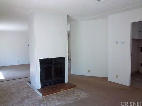Fireplace between Living and Family Rooms