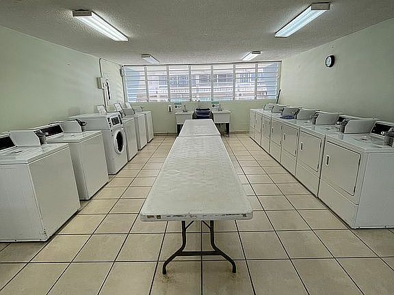 Mezzanine area for laundry