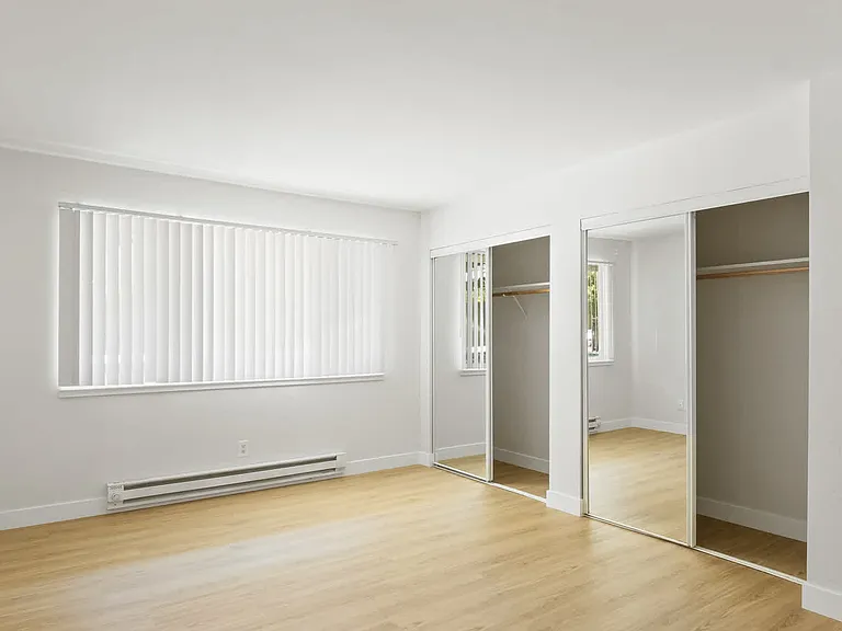 Bedroom with In-home Washer and Dryer