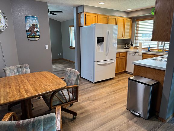 Kitchen has electric cooktop/oven, microwave, dishwasher, trash service is included.