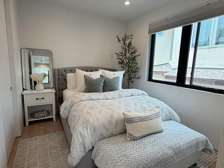 Bedroom with 2-closets & ceiling fan