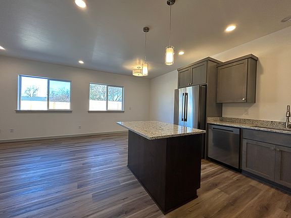 Kitchen open to living and dining