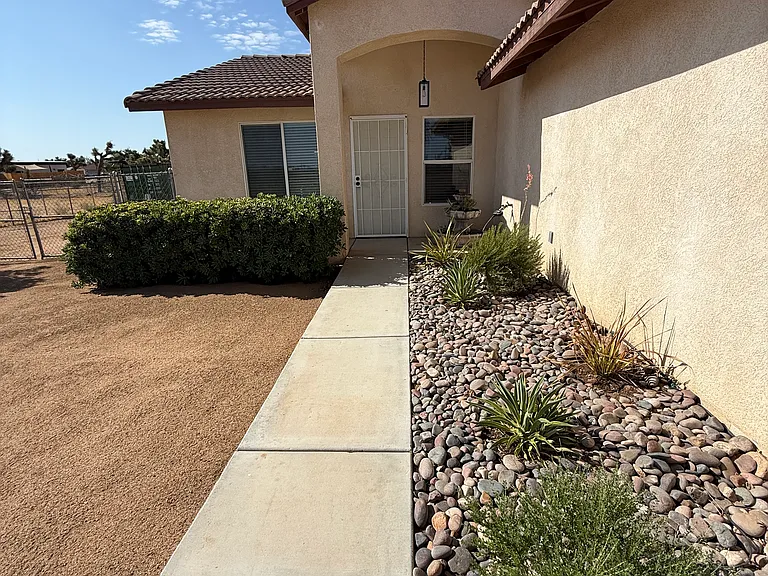 Front of house. (Never worry about watering) plants on irrigation system