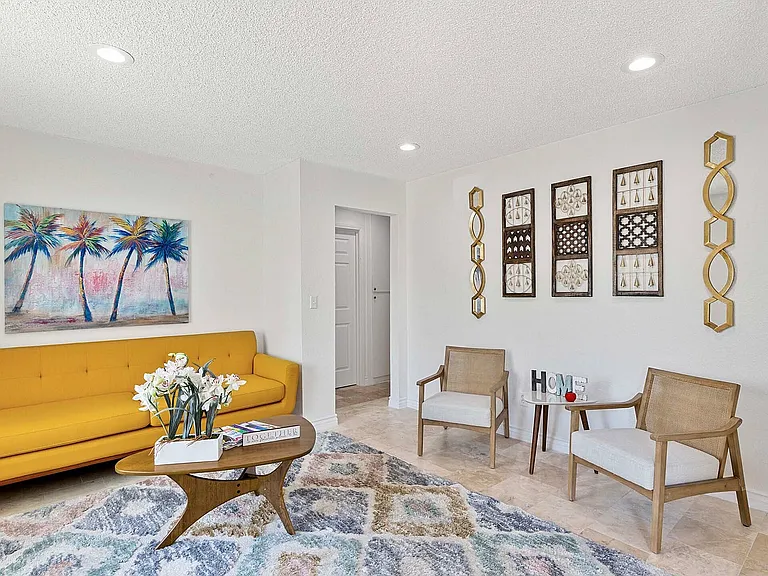 Experience comfort and style in this vibrant living room.