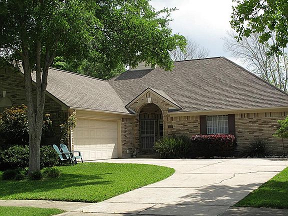 Two car side load garage allows for additional parking.