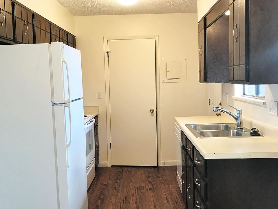 Kitchen with separate laundry room