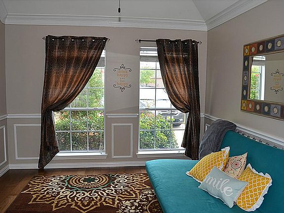Formal dining room can also be used as a study or as super chick toy room!
