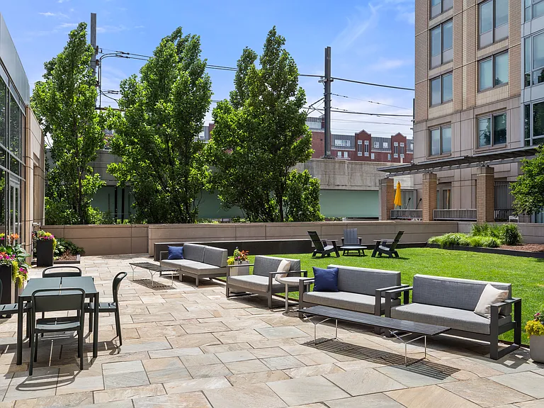 The community courtyard offers fresh air, green surroundings, and a serene place to unwind steps from your apartment home