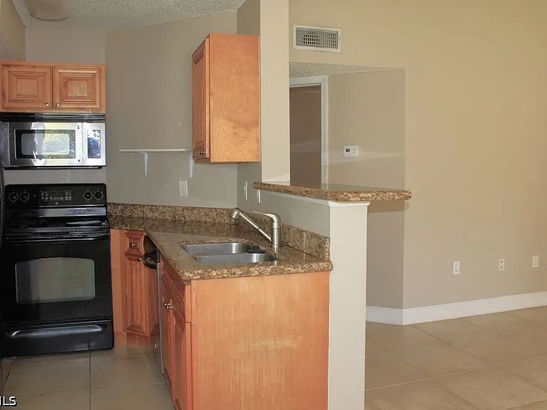 12550 Equestrian Cir #608 — Photo 5
