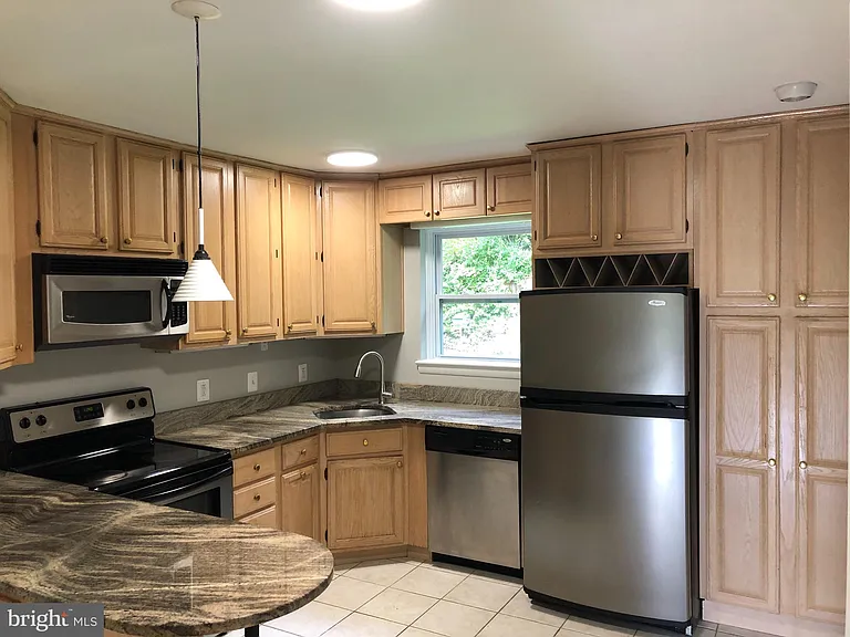 2701 Lorcom Ln — Photo 3