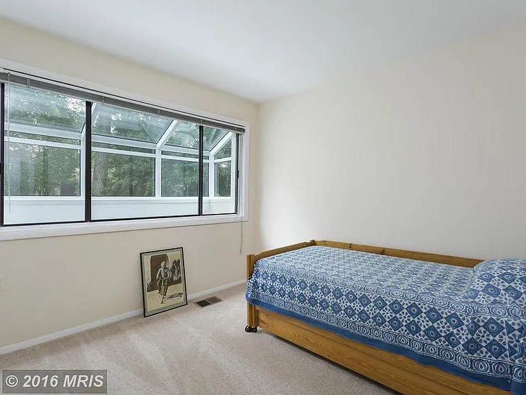 Bedroom looks out into skylight