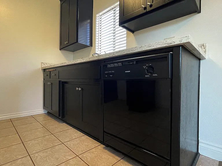 Dishwasher, stove, microwave and garbage disposal included