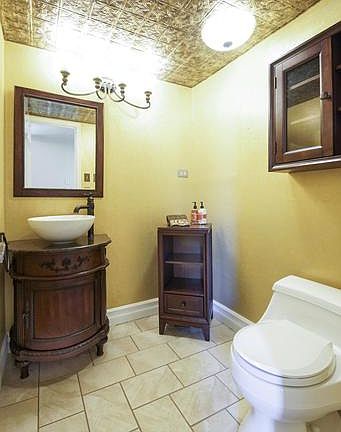 A gorgeous half bath on the main level