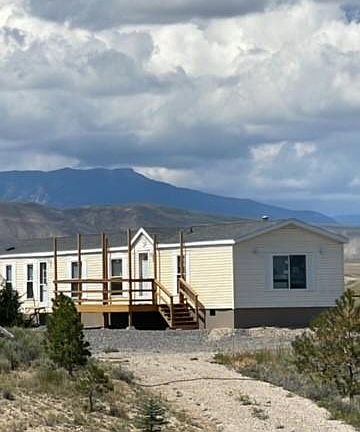 the front of the house.
Large deck and plenty of parking