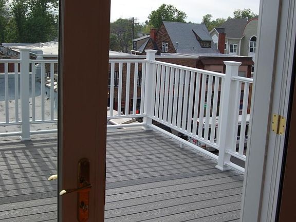 Gorgeous Pella french doors leading to immense deck/balcony