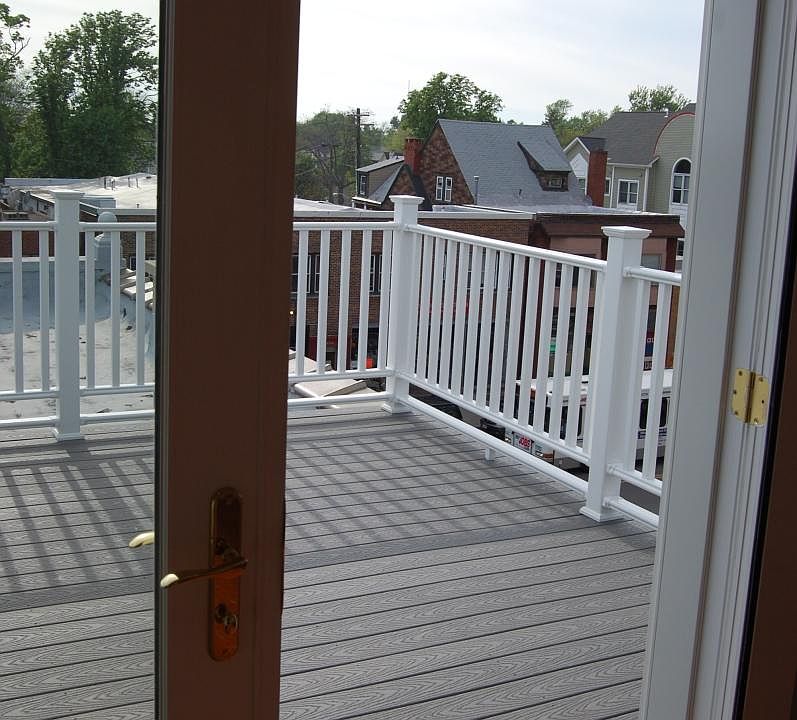 Gorgeous Pella french doors leading to immense deck/balcony