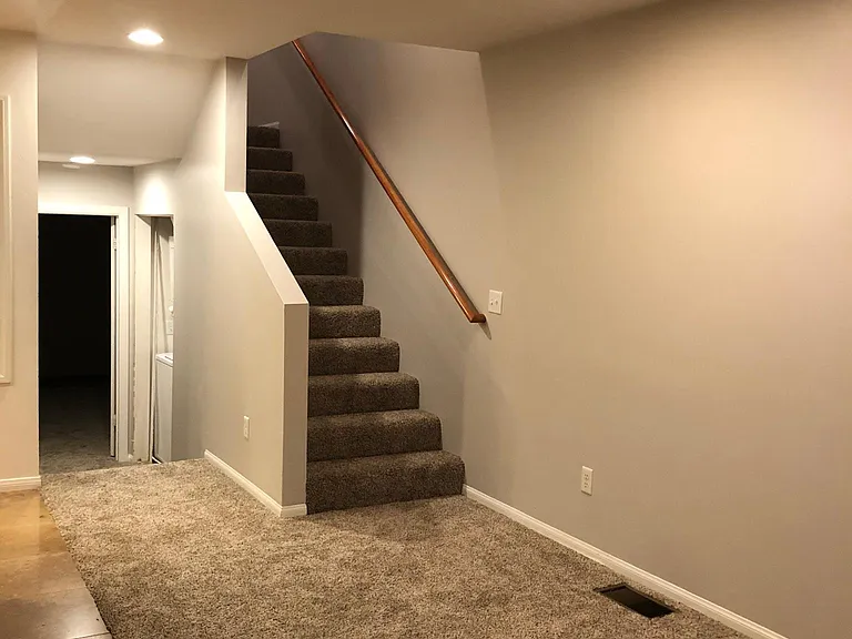 Dining area leading up to top floor