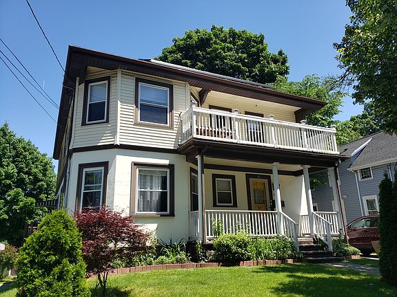 Seen from across the street. Note the 2nd floor large outdoor porch overlooking the street.