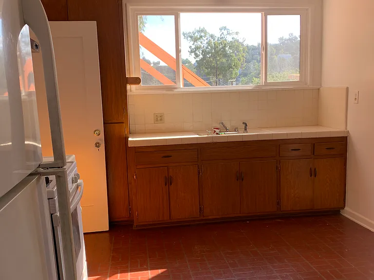Look out the window while at the kitchen sink