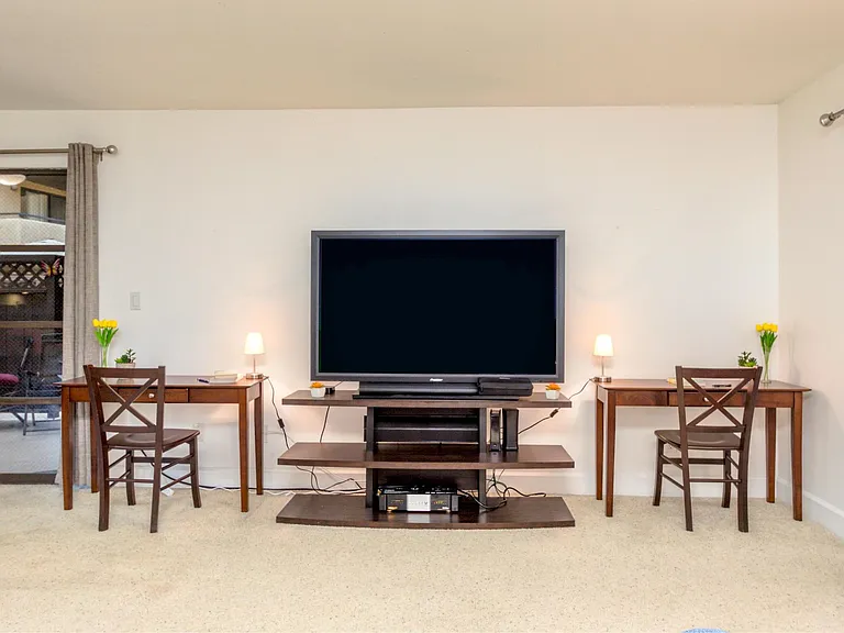 Spacious Living Room with 60" HD Smart TV, high speed WiFi and 3 desk work spaces