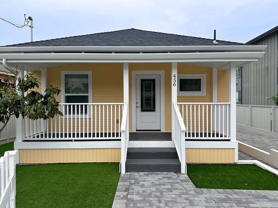 Front entry with sitting porch.