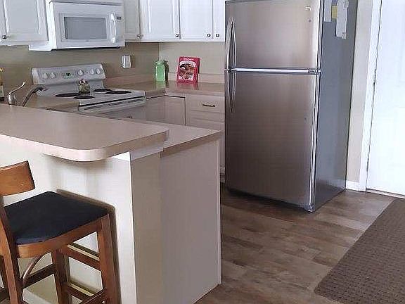Newer fridge and flooring
