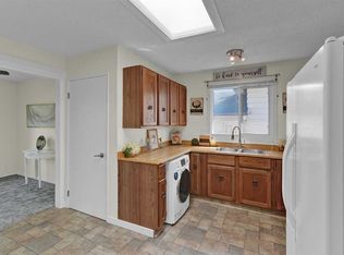 27 N Bedridge Way NE, Calgary, AB T3K 1M2